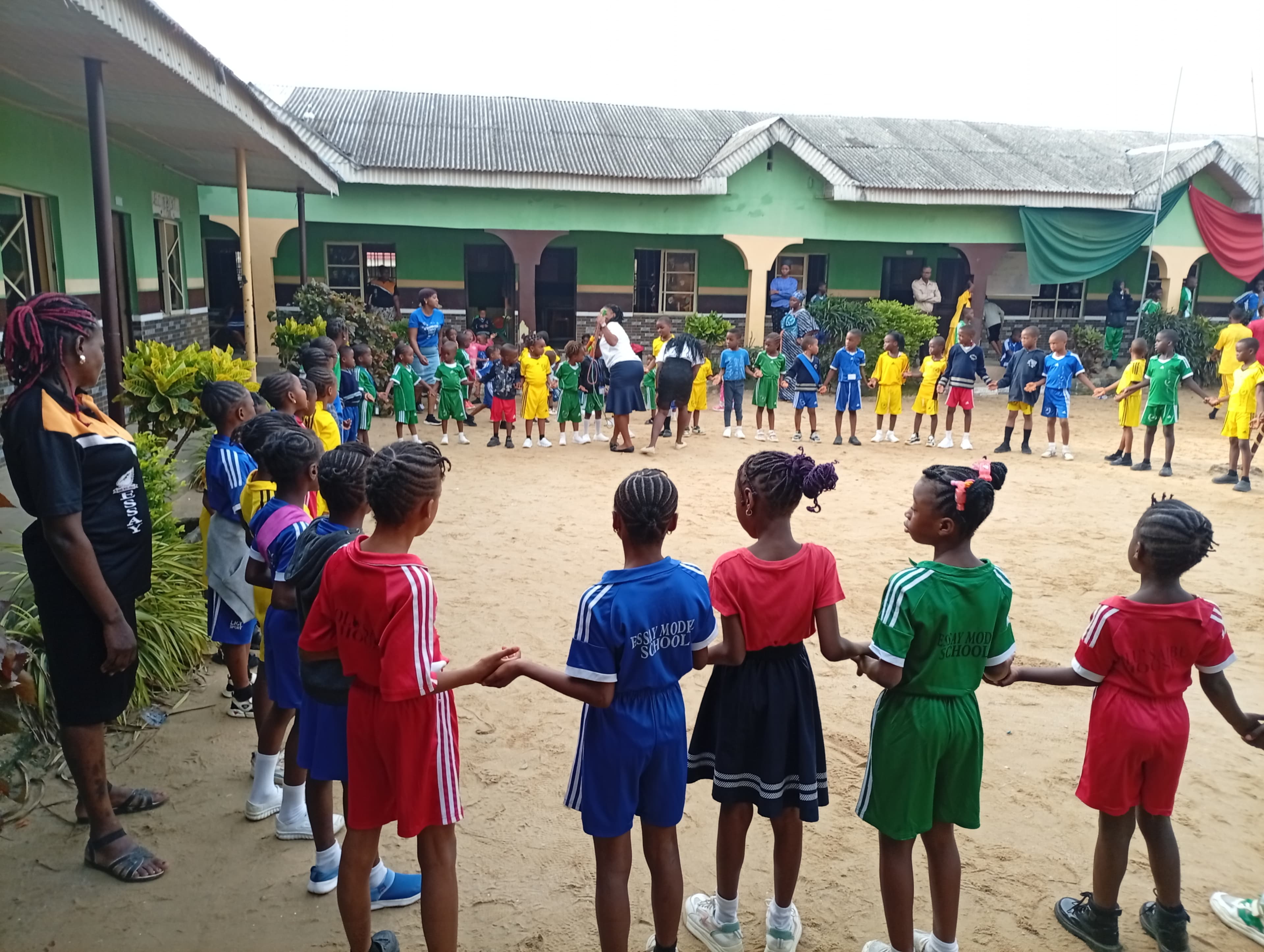 Morning assembly and games in the courtyard