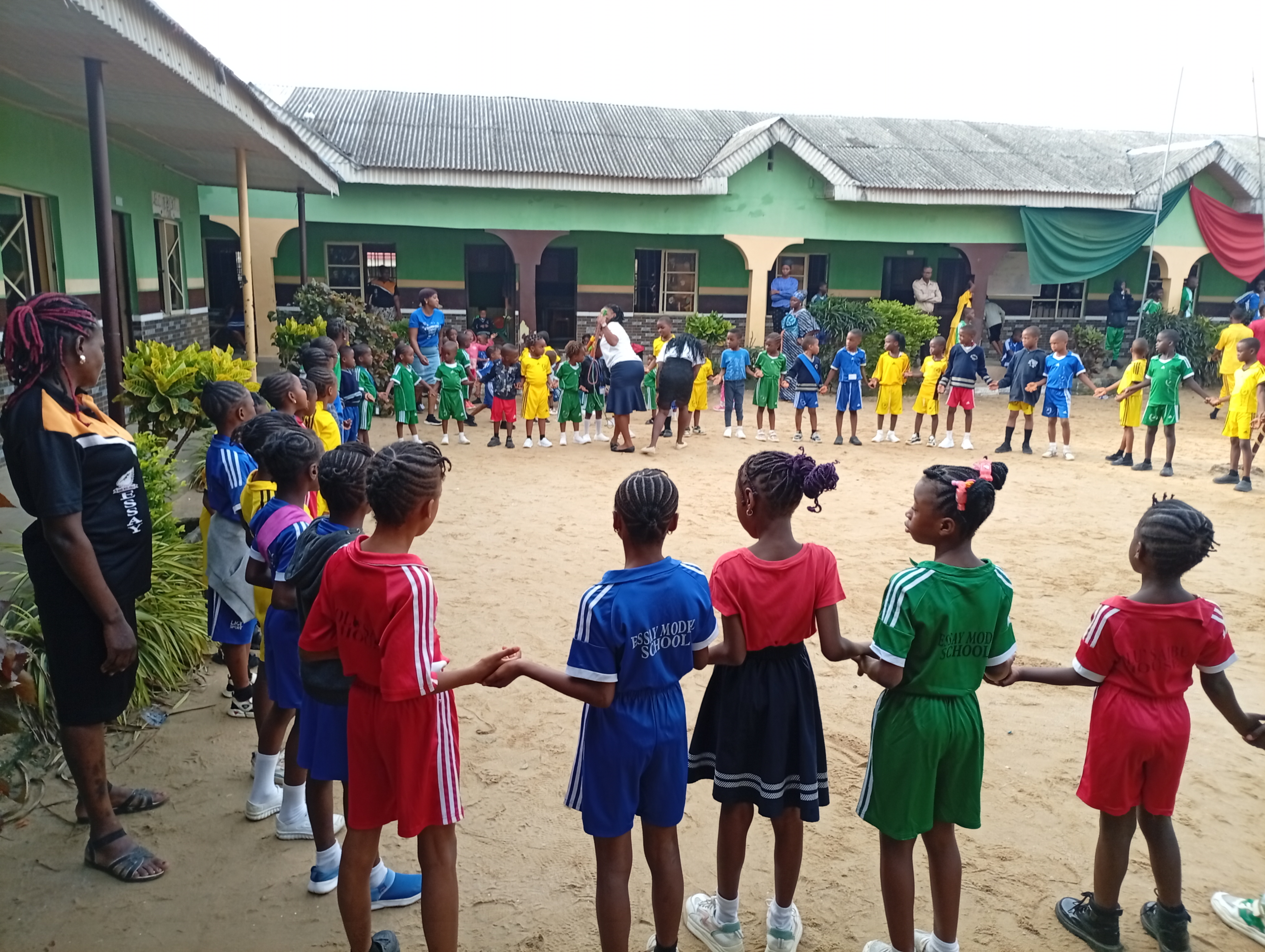 Morning assembly and games in the courtyard