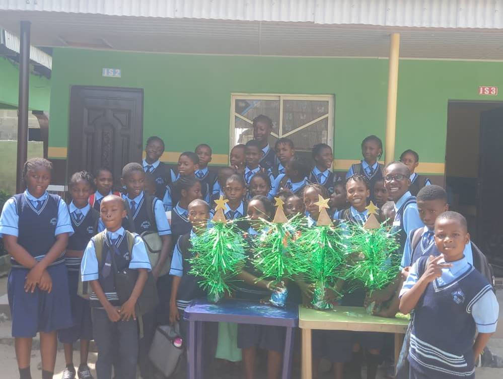 Primary students with their craft projects